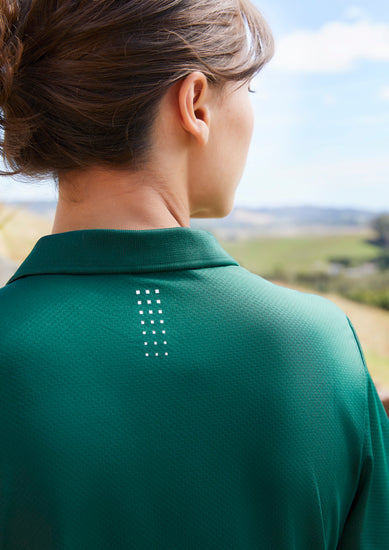 Image showing a woman wearing a Maxi Honeycomb Knit Women's Polo during a casual day out.