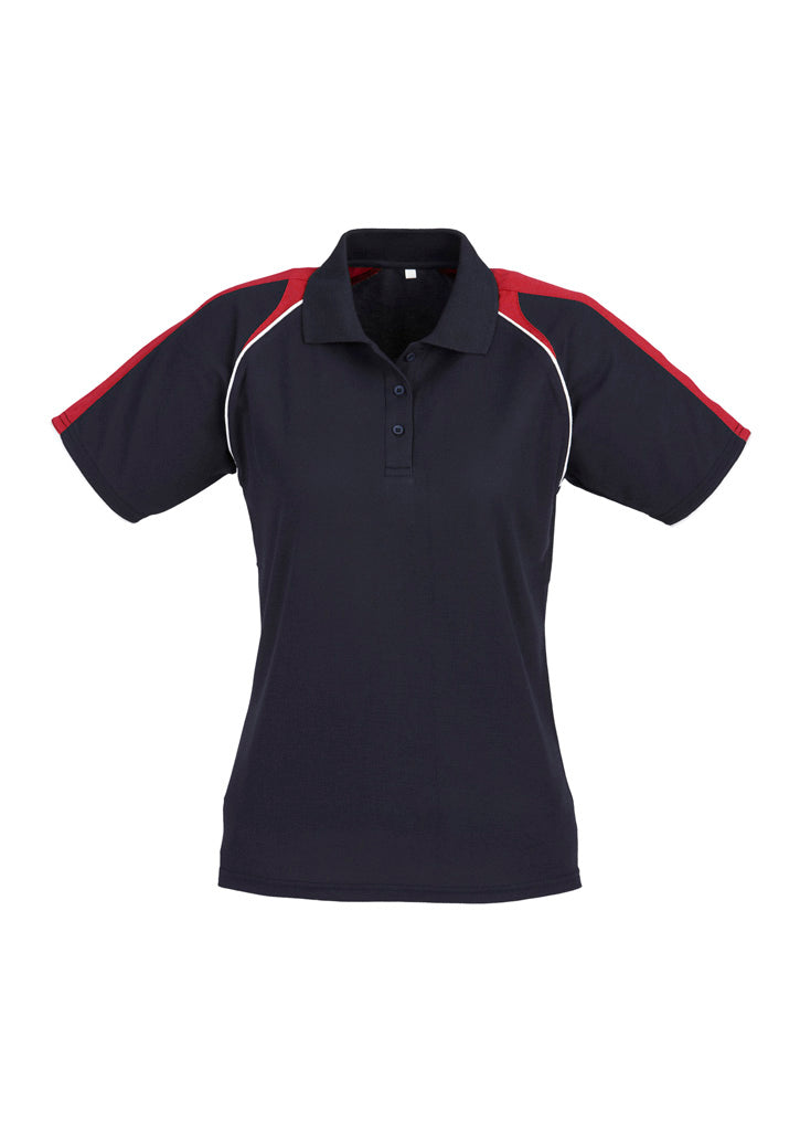 Image of a woman in a Velocity Moisture Wicking Women's Polo during a gym session.
