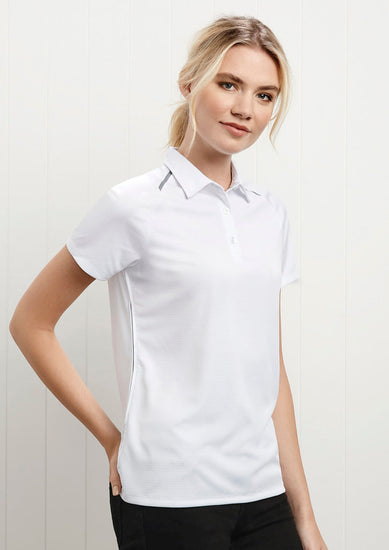 Image showing a woman in a Spartan Anti-Shrink Women's Polo at a professional seminar.